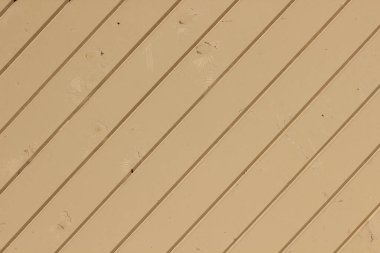Bej panellerde birden fazla düğümle boyanmış kenar kaplamasının dokusu