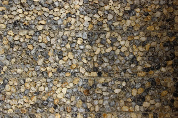 Uma Parede Pedra Seixo Feita Pedras Naturais Com Metade Sombra — Fotografia de Stock