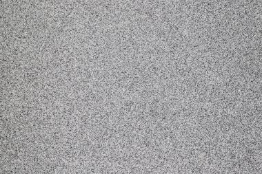 Siyah-beyaz granüler taş yüzeyinin dokusu