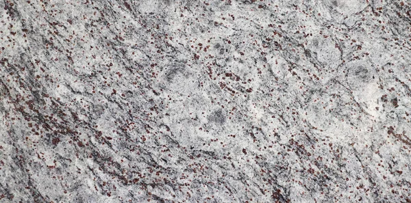Nahaufnahme Einer Schwarz Weißen Granitsteinoberfläche Mit Roten Einschlüssen — Stockfoto