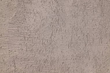 Bir binanın dış kaplaması olarak kullanılan alçı dokusu