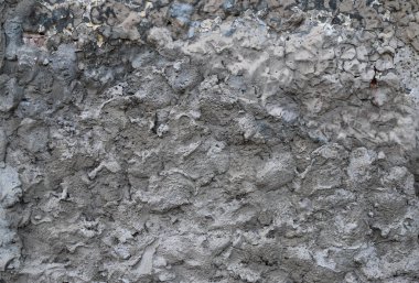 Bir binanın dış kaplaması olarak kullanılan çimento dokusu