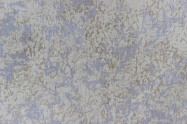 Çeşitli renklerde dekoratif sıva işçiliğine sahip beton bir duvarın dokusu