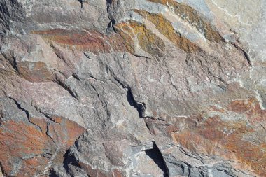 Arkaplan olarak renkli doğal bir taşın dokusu