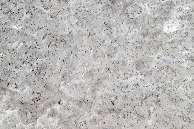 Arka plan olarak doğal taştan yapılmış eski bir duvarın dokusu