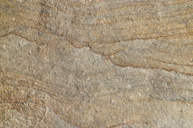 Arkaplan olarak katman yapısı olan renkli doğal bir taşın dokusu