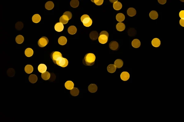 Die goldenen Seiten oder boke auf einem schwarzen Hintergrund. Frohe Weihnachten und ein gutes neues Jahr. Weihnachtlicher Hintergrund. — Stockfoto
