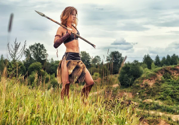 Girl warrior in the field. Amazon on patrol — Stock Photo, Image