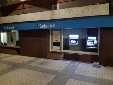Ibi, Alicante, Spain - November 18th, 2020: Facade of a Sabadell bank office branch. Currently in a bank merger with BBVA group.
