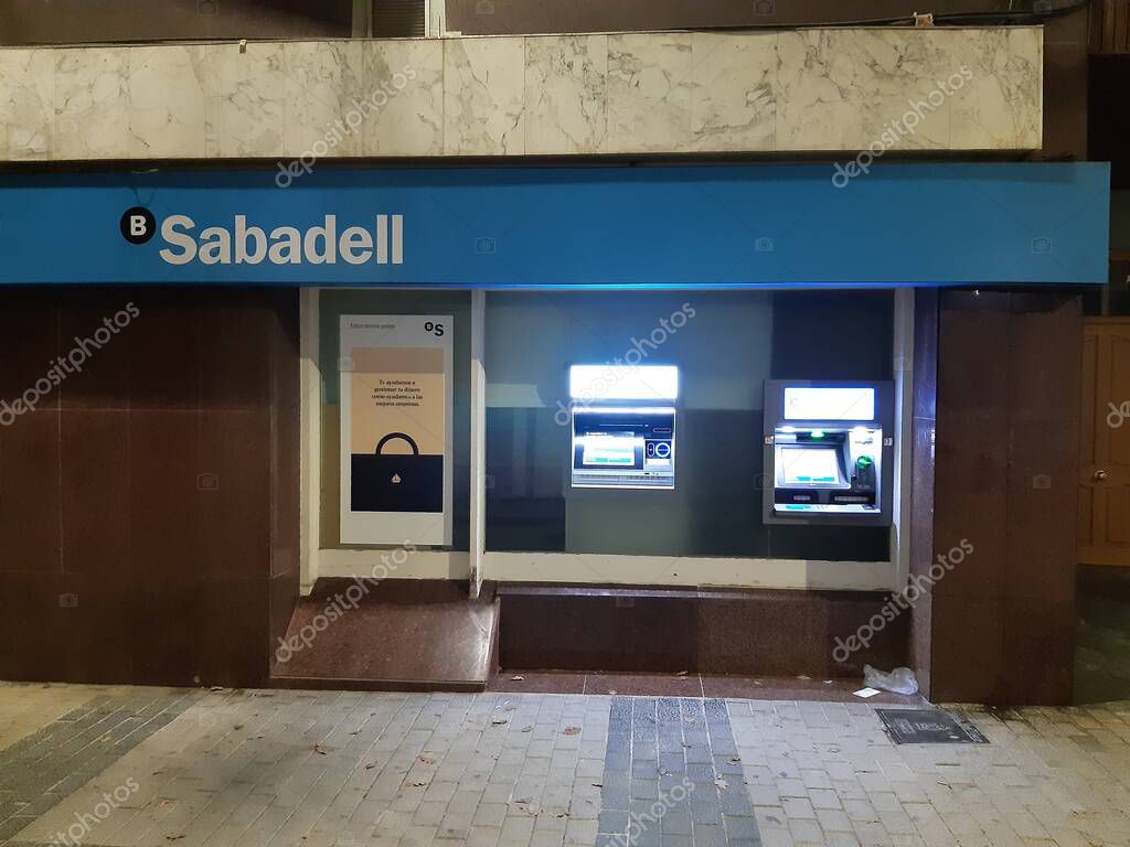 Ibi, Alicante, Spain - November 18th, 2020: Facade of a Sabadell bank office branch. Currently in a bank merger with BBVA group.