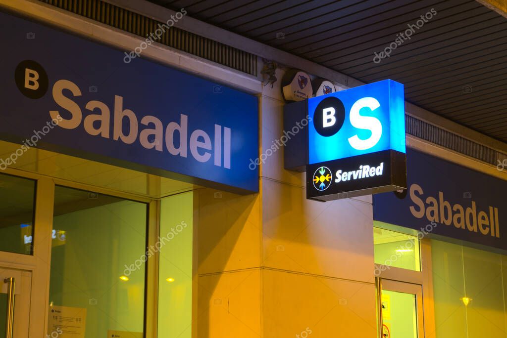 Alcoy, Alicante, Spain - November 18th, 2020: Facade of a Sabadell bank branch office. Currently in a bank merger with BBVA group.