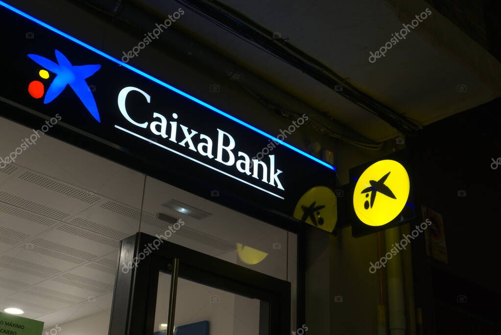 Ibi, Alicante, Spain - November 18th, 2020: Facade of a Caixabank bank branch office. Currently in a bank merger with Bankia group.