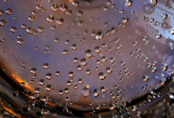 Graphic resource, background, screen saver-bubbles of gas moving in water inside a glass, wine glass