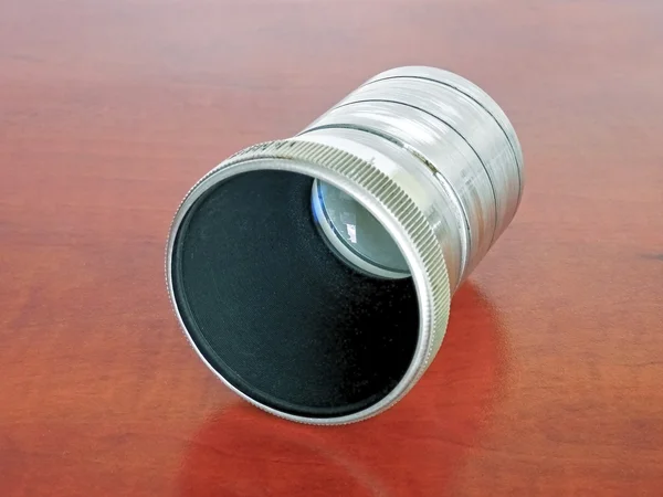 Lens from an old slide projector — Stock Photo, Image