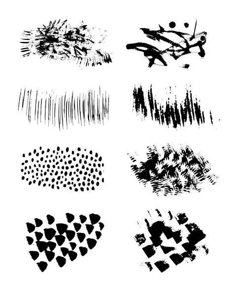 Set de vectores grunge y pinceles de tinta. Elementos abstractos de diseño negro . — Vector de stock