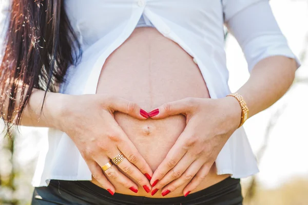 Pregnant Belly Expecting Baby Heart Shaped Hands — Stock Photo, Image