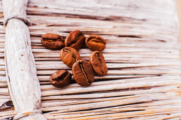 Aromatic coffee beans. preparation scrub of ground coffee. ground and whole coffee beans.coffee beans.Roasted coffee beans goals.spoon ground coffee, sugar cubes