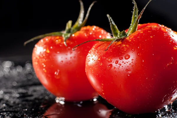 Tomatoes with drops — Stock Photo, Image