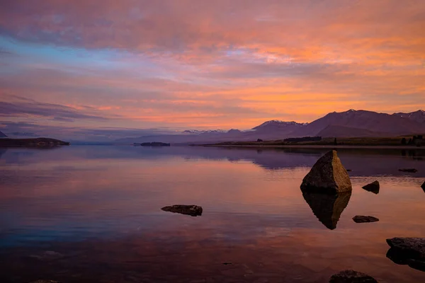 Lake Tekapo in the glow of the spring sunrise, shot in Spring 2020