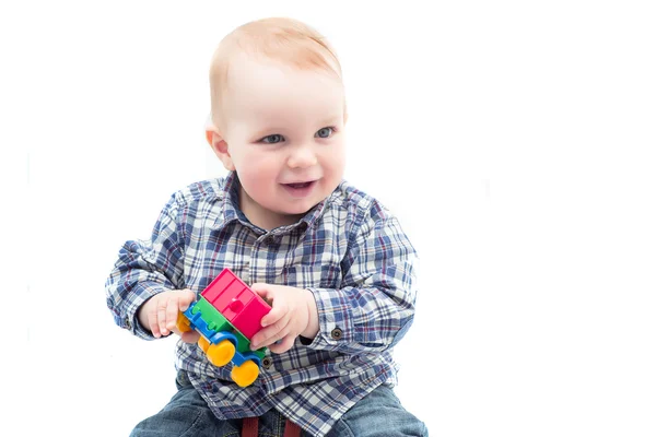 Kleines Kind spielt mit Spielzeug — Stockfoto