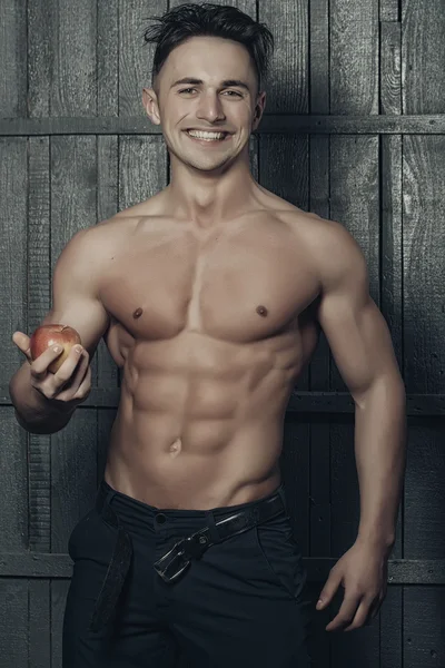 Statný muž s apple — Stock fotografie