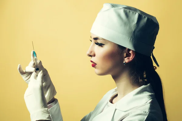 Female doctor with syringe — Stock Photo, Image