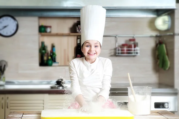 Funny girl making dough — Stock Photo, Image