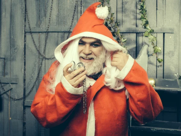 Weihnachtsmann mit Uhrenmedaillon — Stockfoto