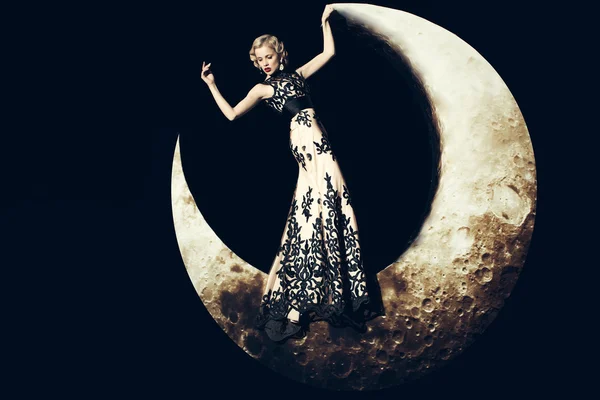 Woman in dress on moon