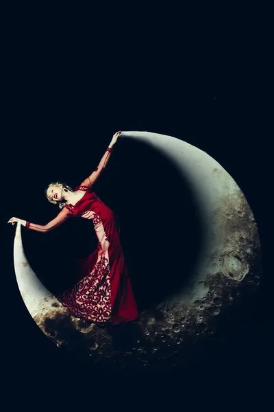 Woman in dress on moon — Stock Photo, Image
