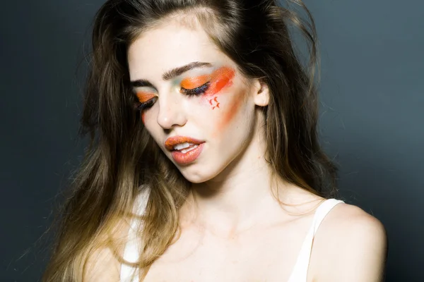 Menina com maquiagem laranja close-up — Fotografia de Stock