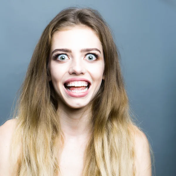 Smiling young blonde girl — Stock Photo, Image