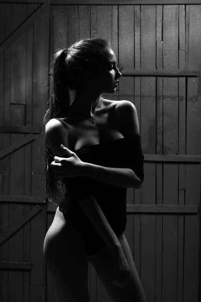 Het tjej i svarta bodysuit — Stockfoto