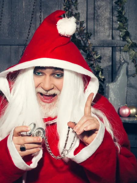 Mutlu Noel adam ile masa saati — Stok fotoğraf