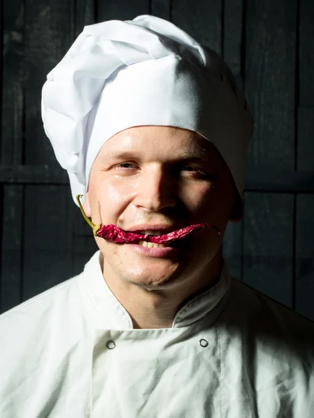 Chef with chili pepper — Stock Photo, Image