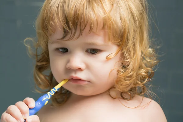 Baby boy with teeth brush — Stock Photo, Image