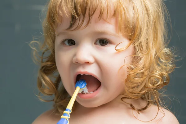 Baby boy with teeth brush — Stock Photo, Image