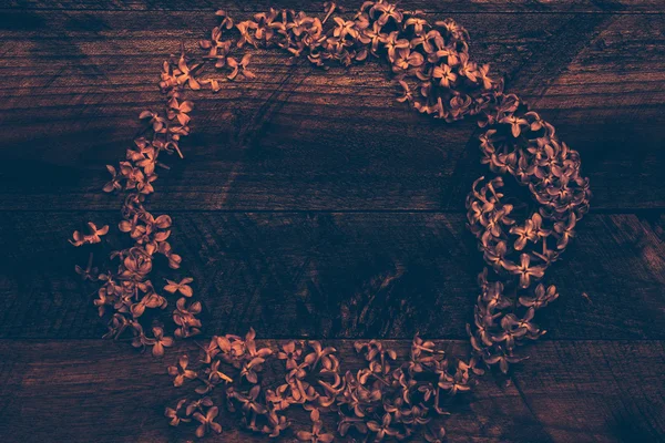 Lilacblomster, dekorativ krans – stockfoto