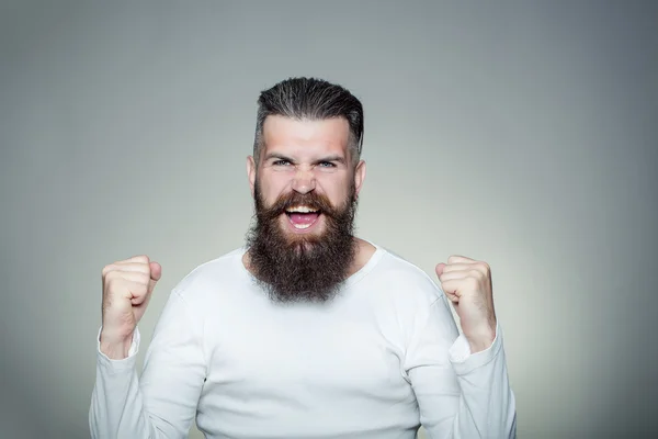 Bebaarde man met gelukkig ja gebaar — Stockfoto