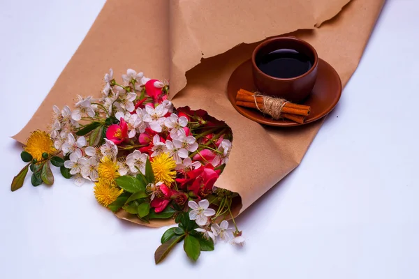 Flowers in brown packing paper