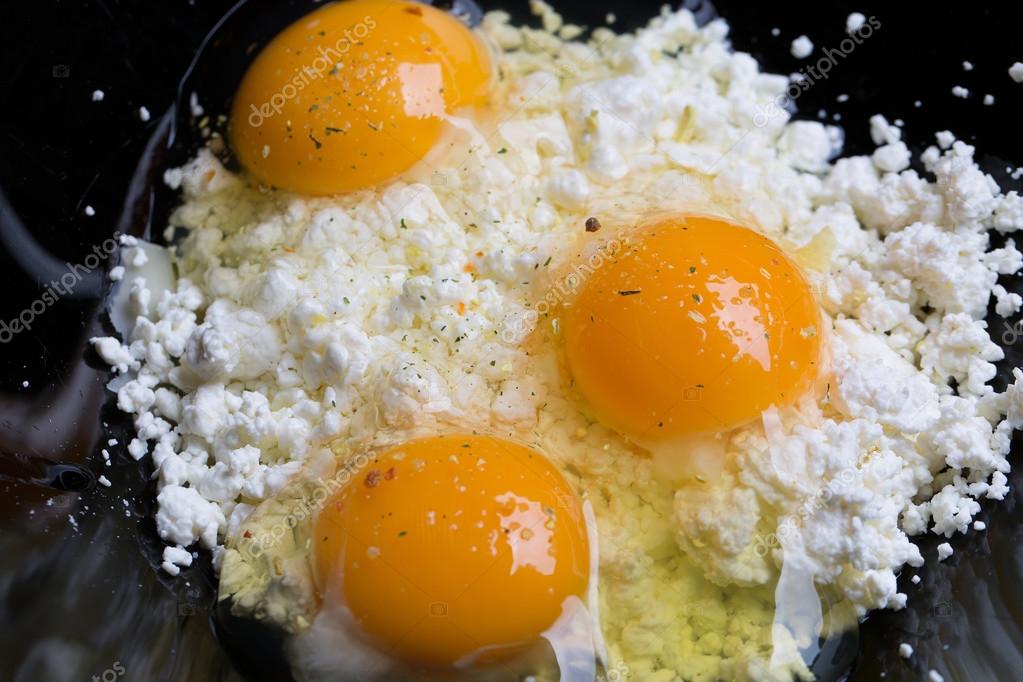 Broken Eggs On Cottage Cheese Stock Photo C Tverdohlib Com