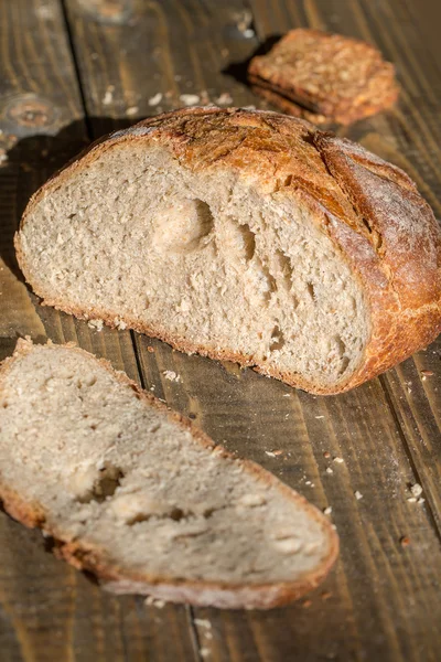 Cut loaf of homemade bread — Stock Photo, Image