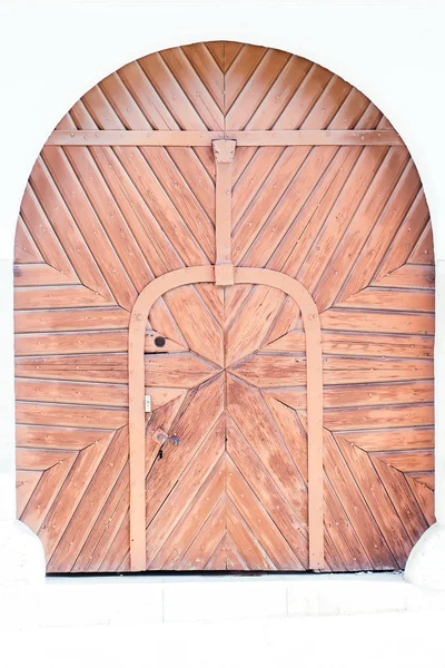Old wooden light brown door — Stock Photo, Image