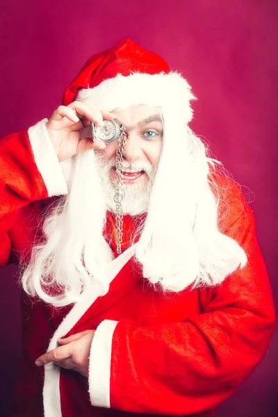 Smiling Christmas man with clock on chain — Stock Photo, Image