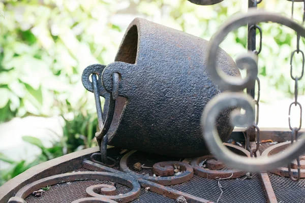 Old ancient cast iron cauldron — Stock Photo, Image