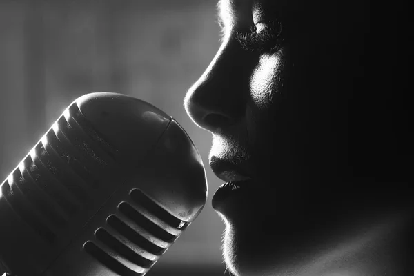 sensual woman with microphone