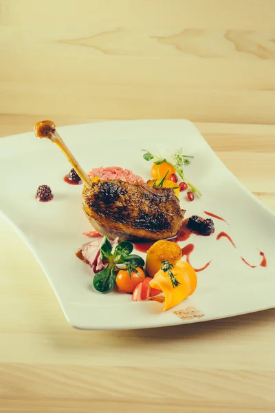 Confit duck or goose leg — Stock Photo, Image