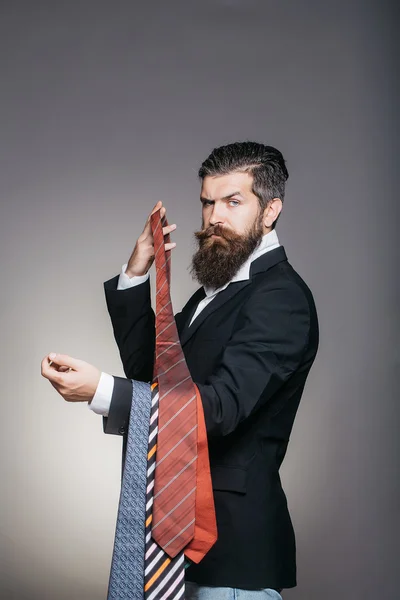 Young man with ties