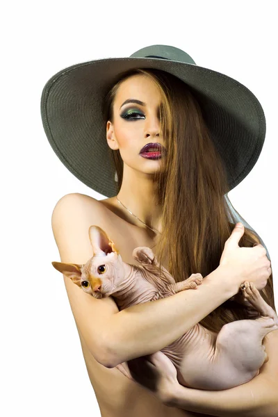 Sexy naked woman with sphinx cat — Stock Photo, Image