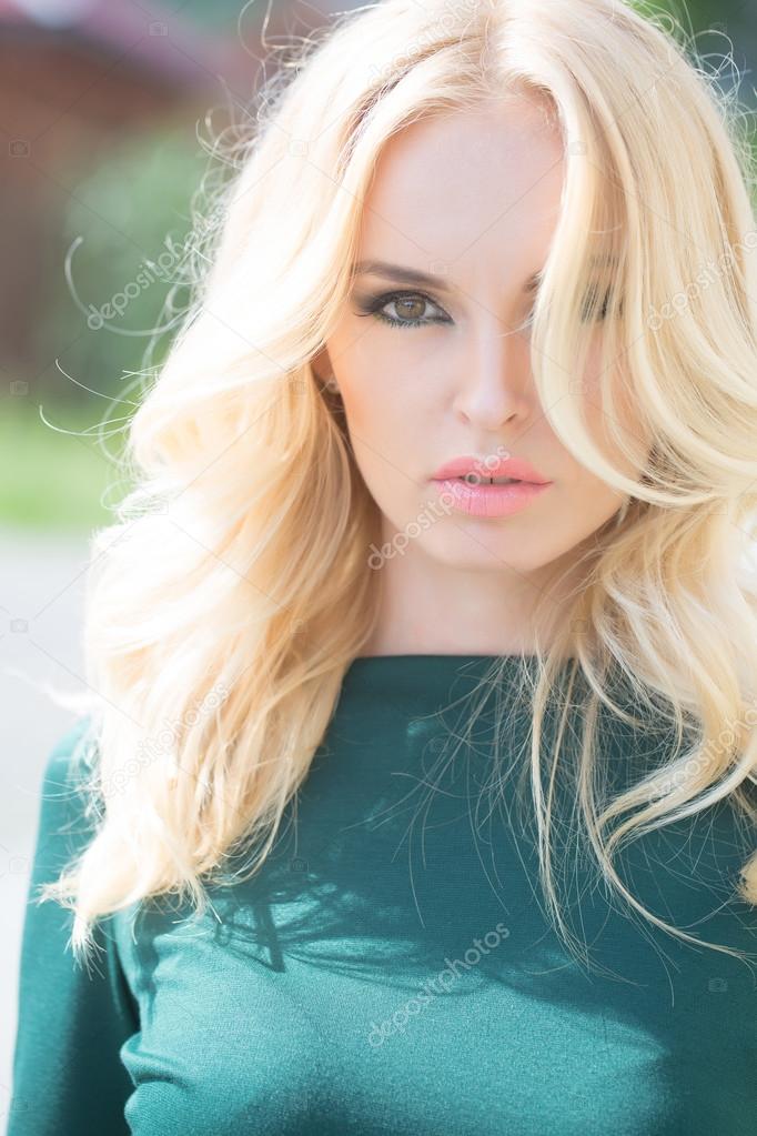 Pretty Blonde Woman In Green Dress Stock Photo C Tverdohlib Com